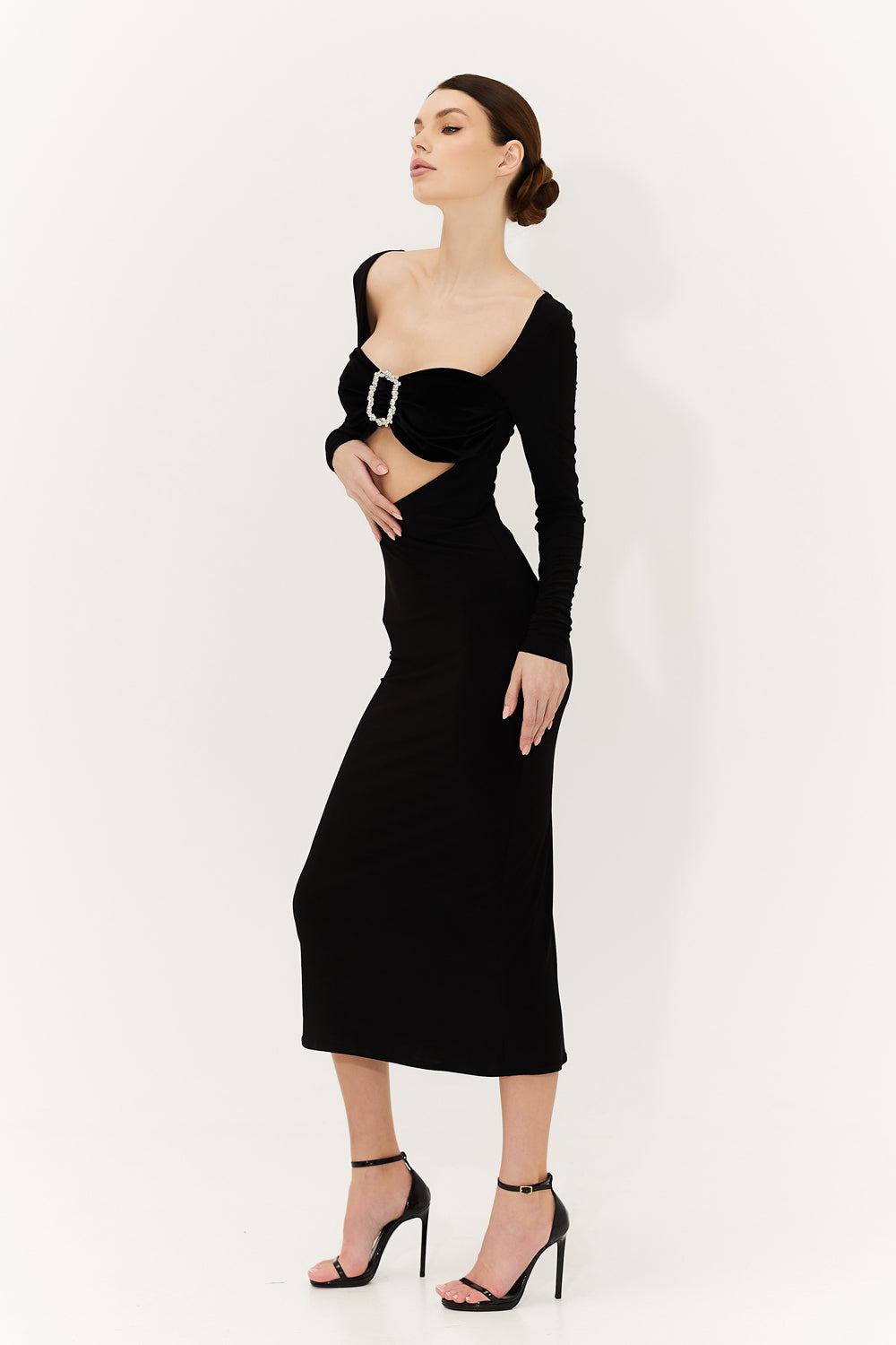 Back view of the dress showing smooth jersey fabric and tailored fit.