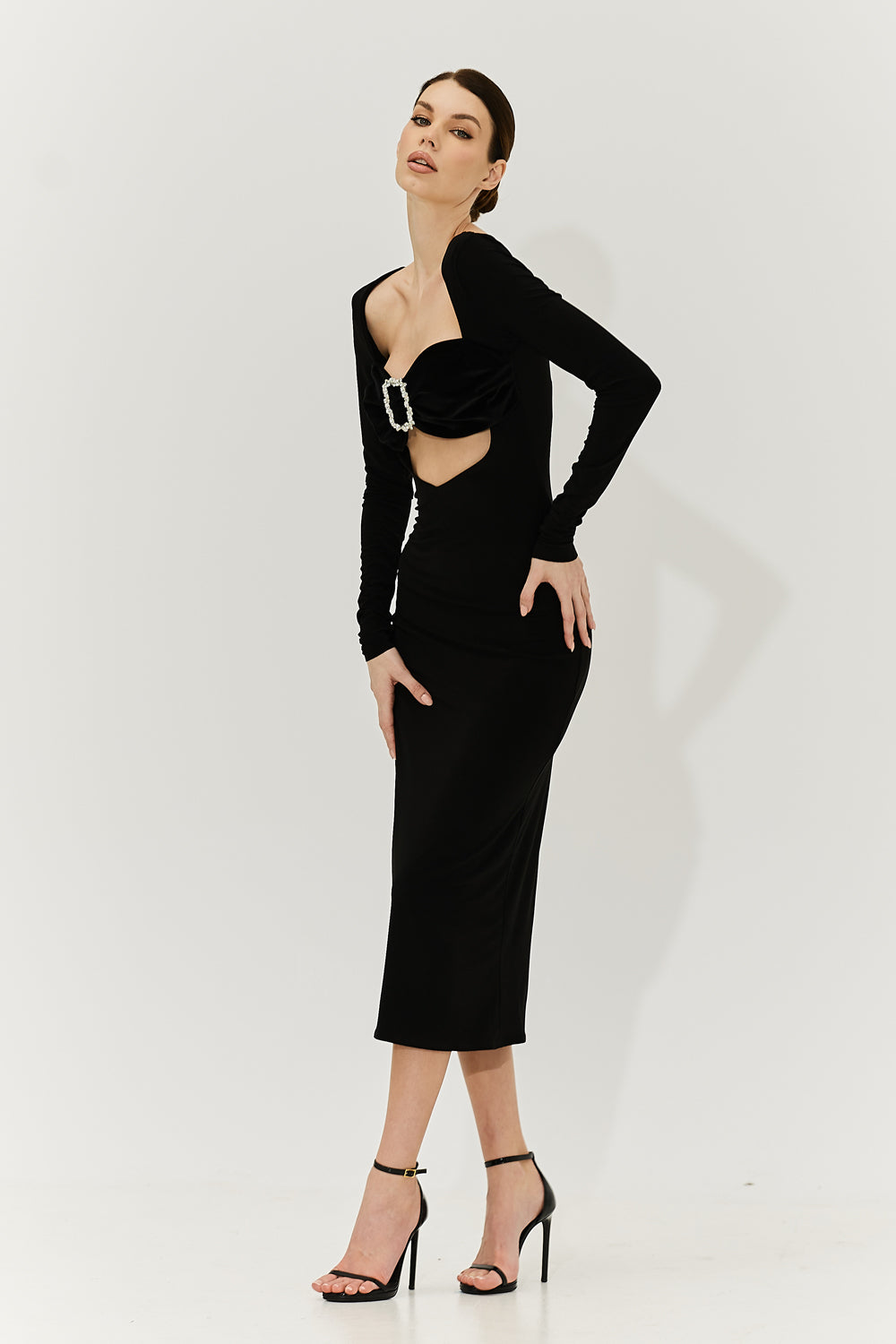 Side profile highlighting the figure-hugging silhouette of the dress.