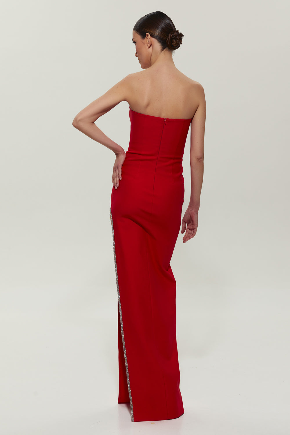 Red dress with slit embellished with crystals