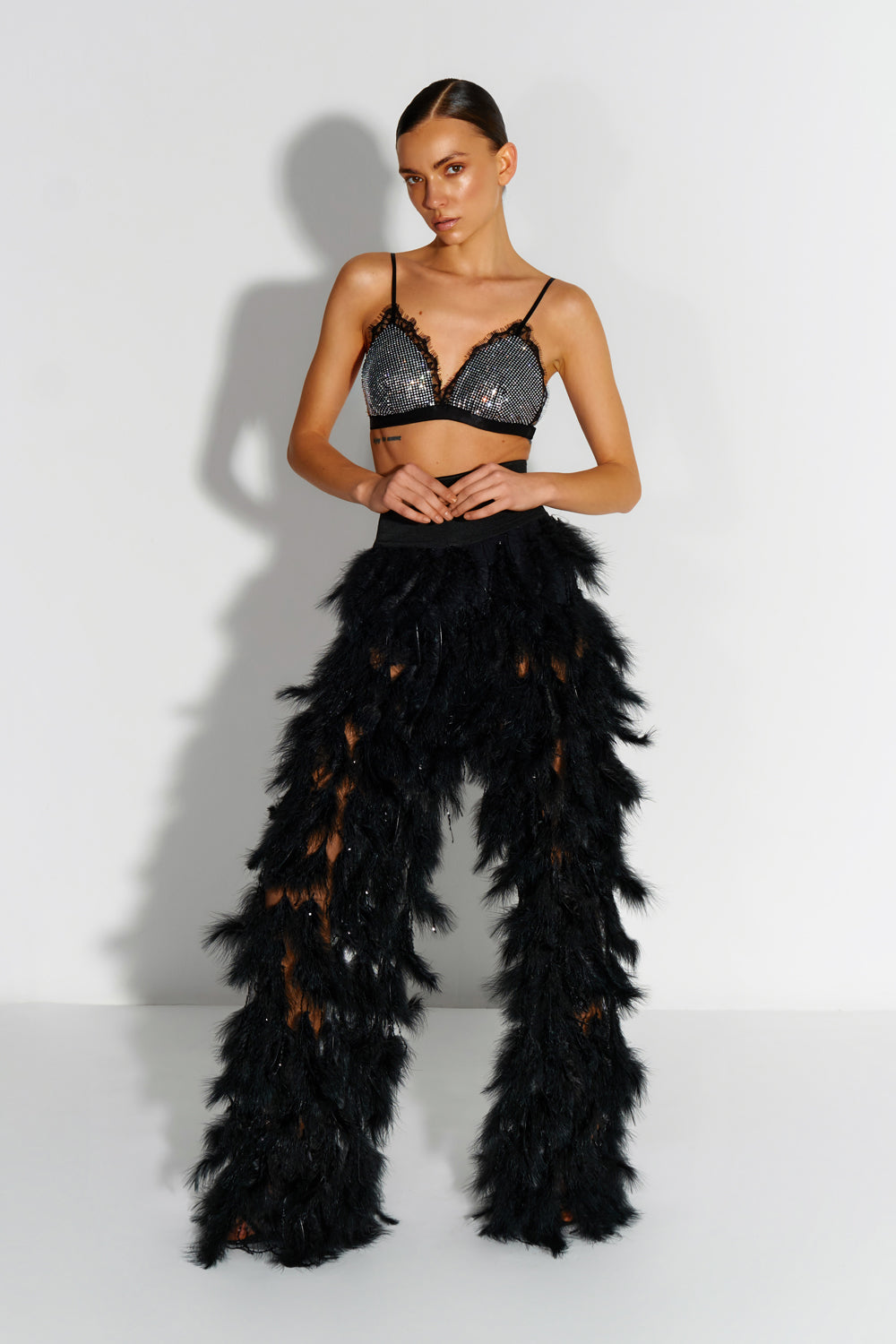 Black feather-embroidered mesh pants