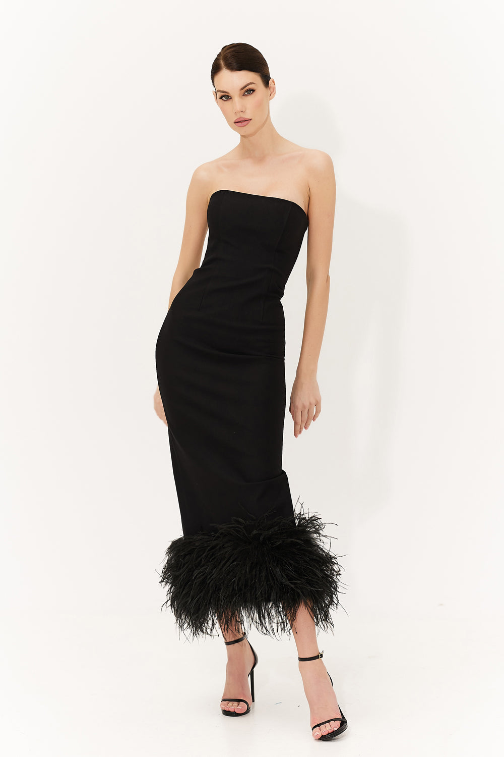 Robe midi en jersey noir avec plumes sur le bas