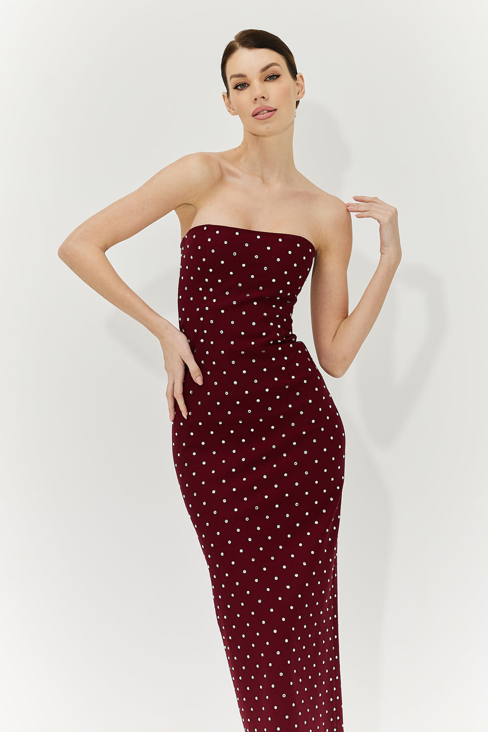 Burgundy bandage midi dress with slit embellished with crystals