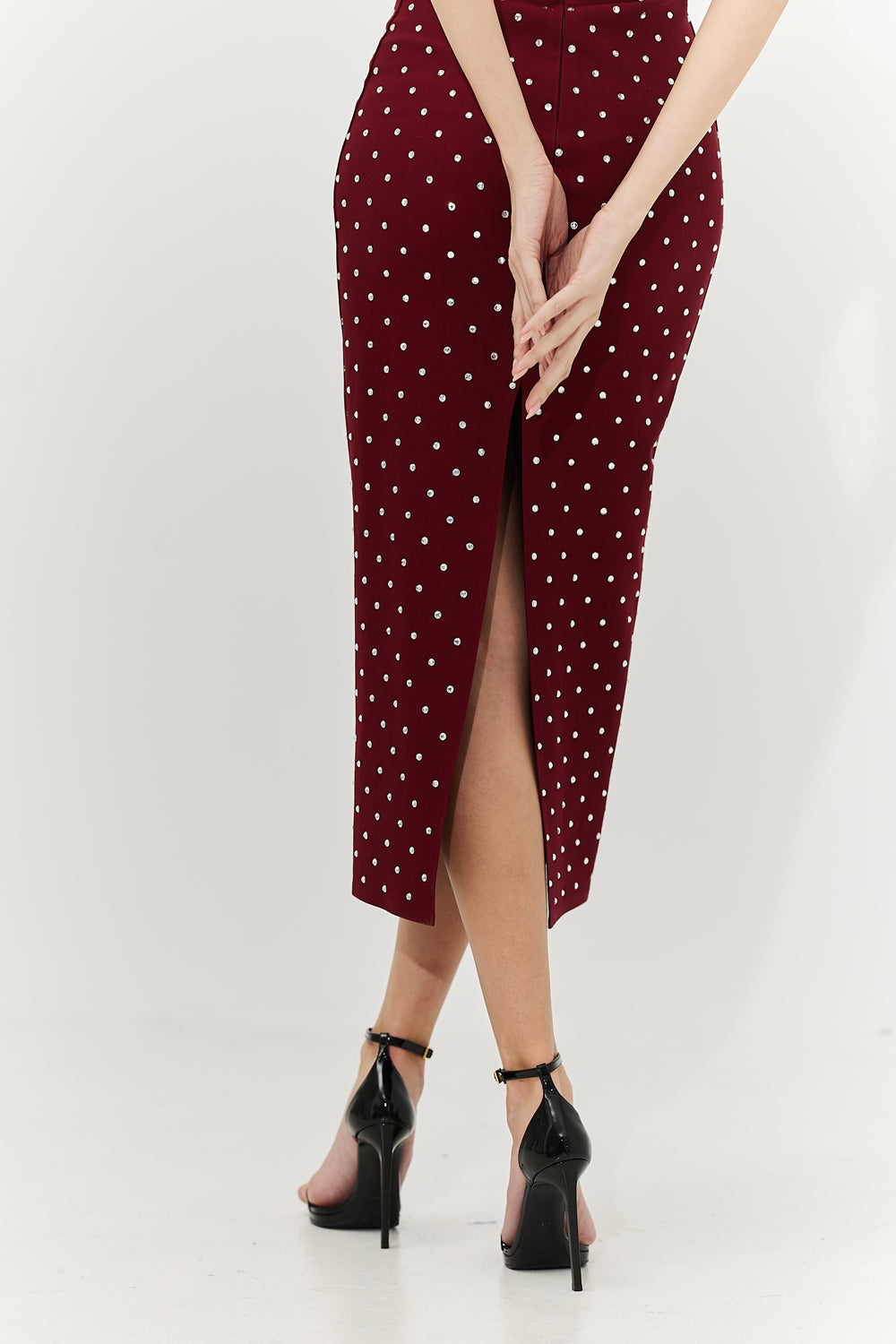 Burgundy bandage midi dress with slit embellished with crystals