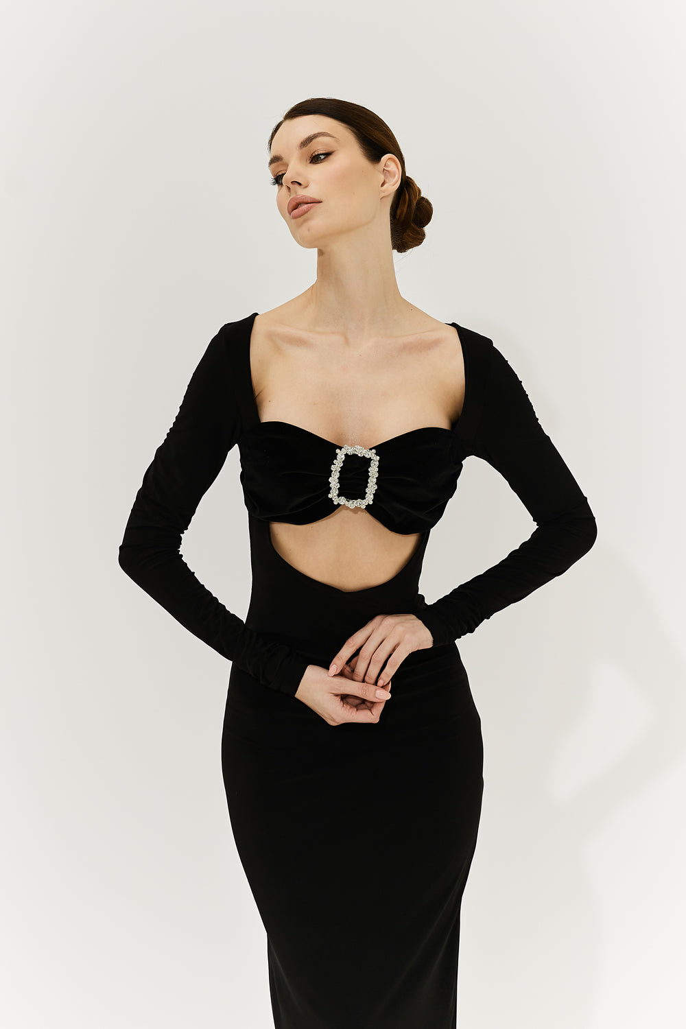 Black jersey dress with velvet bodice.