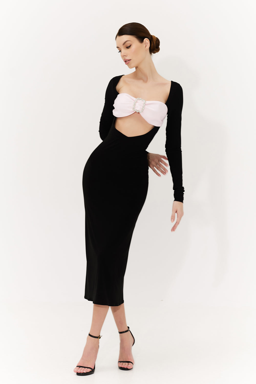 Black jersey dress with a soft pink satin bodice.