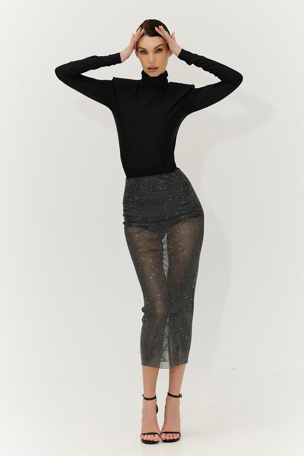 The midi skirt is made of mesh with crystals, the waist is on a handmade elastic band.