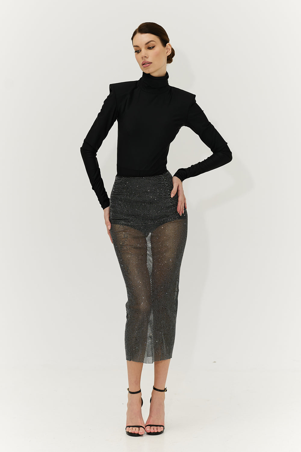 The midi skirt is made of mesh with crystals, the waist is on a handmade elastic band.