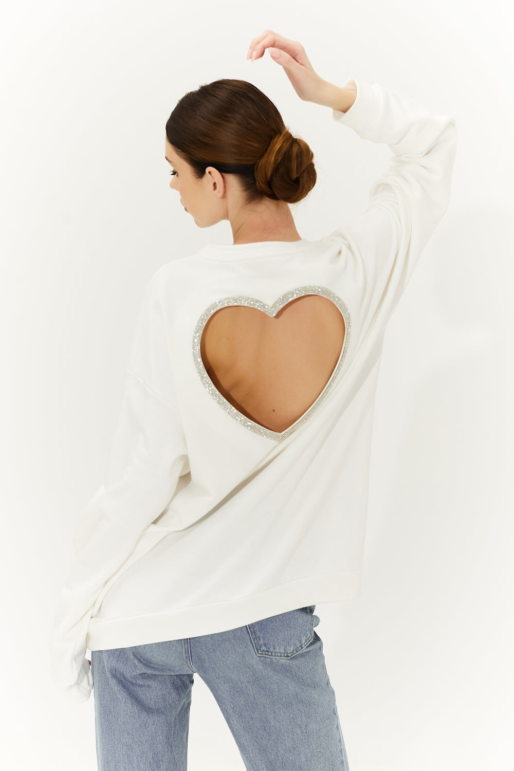 Milk sweatshirt with a heart on the back.