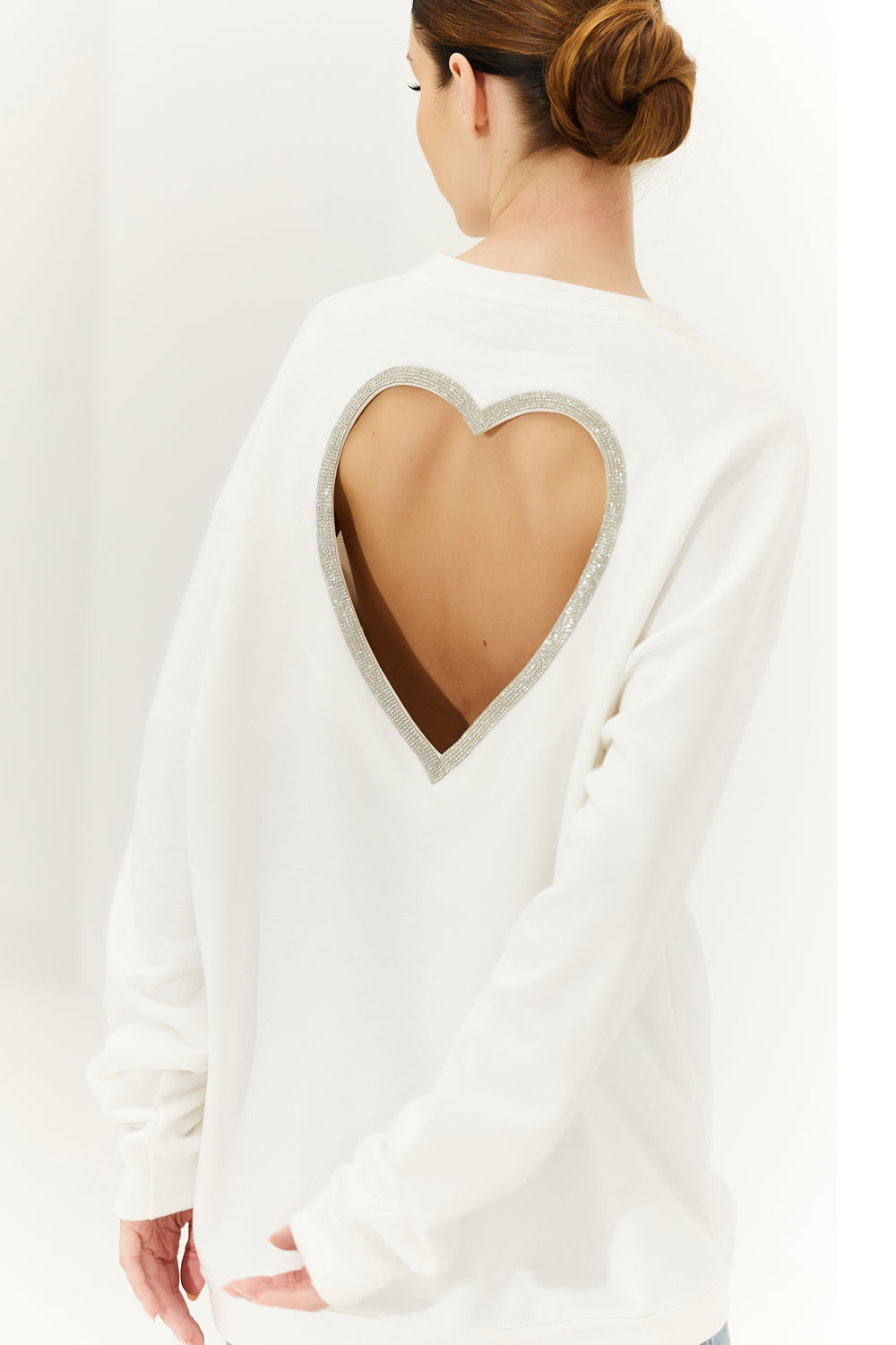 Milk sweatshirt with a heart on the back.