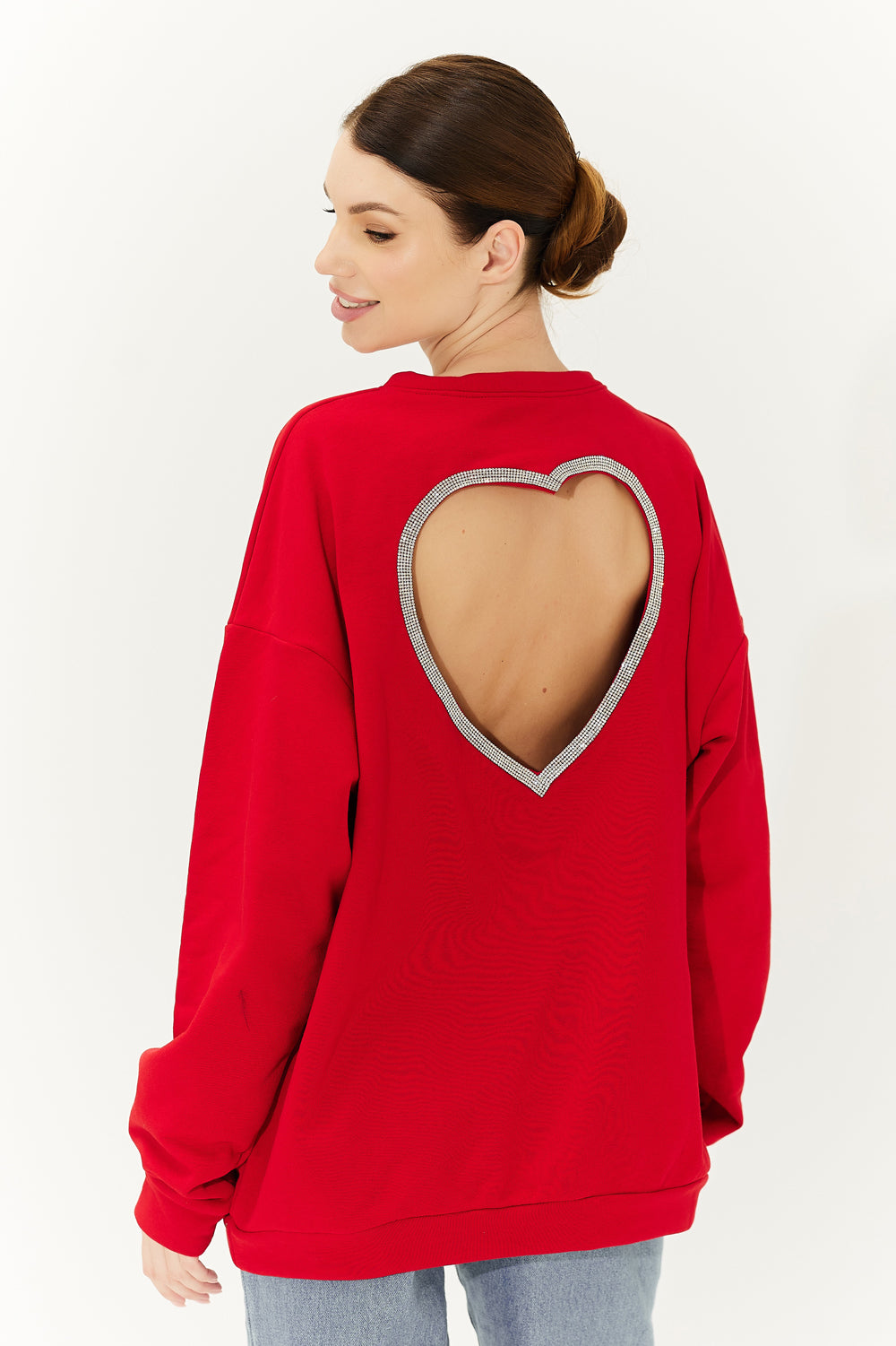 Red sweatshirt with a heart on the back.