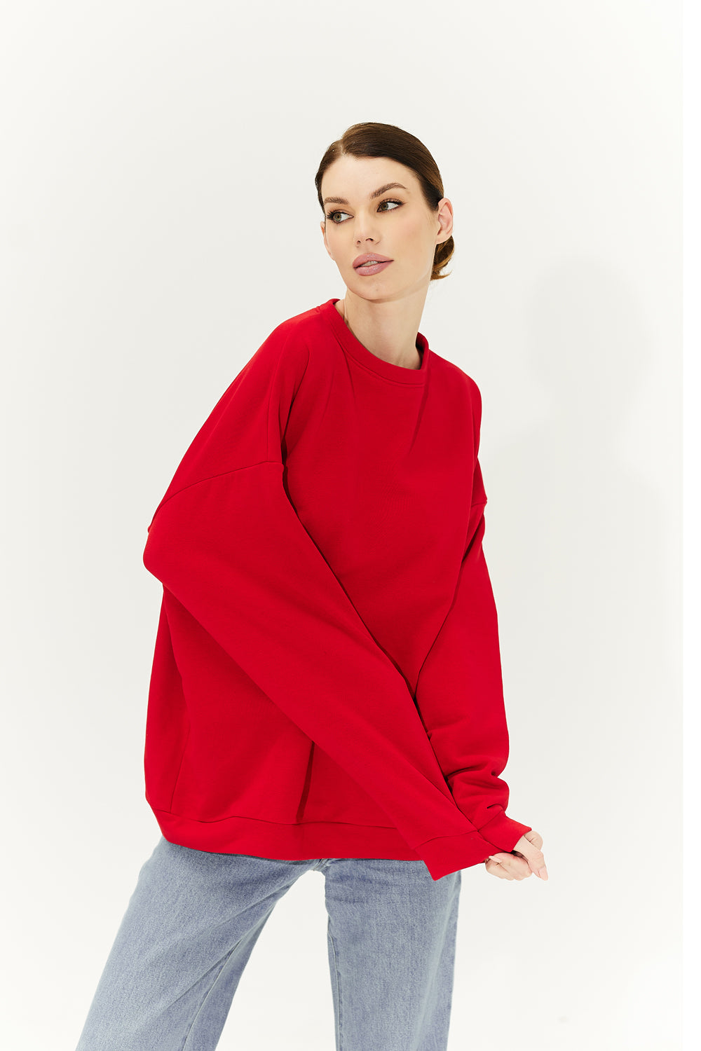 Red sweatshirt with a heart on the back.