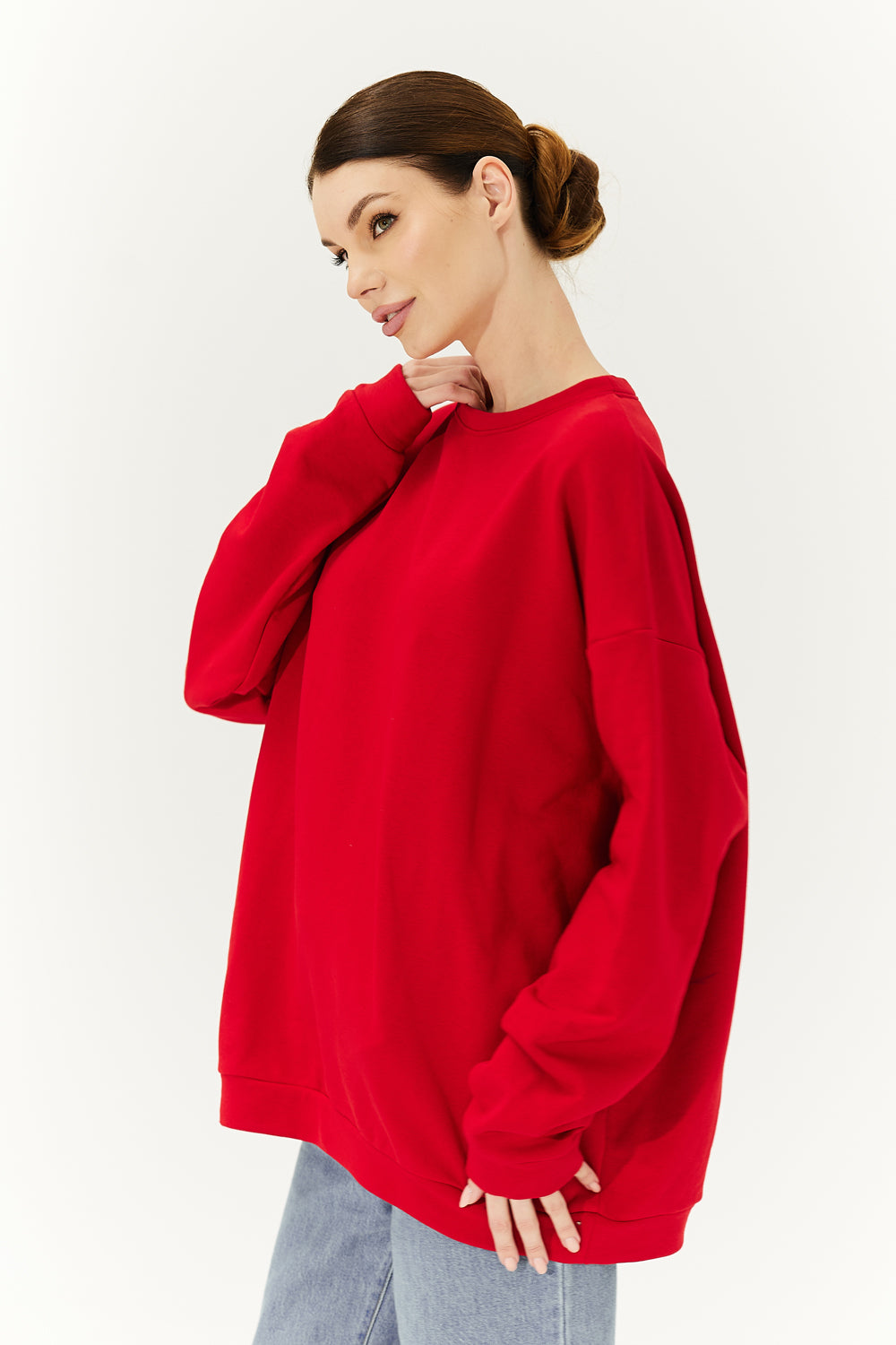 Red sweatshirt with a heart on the back.