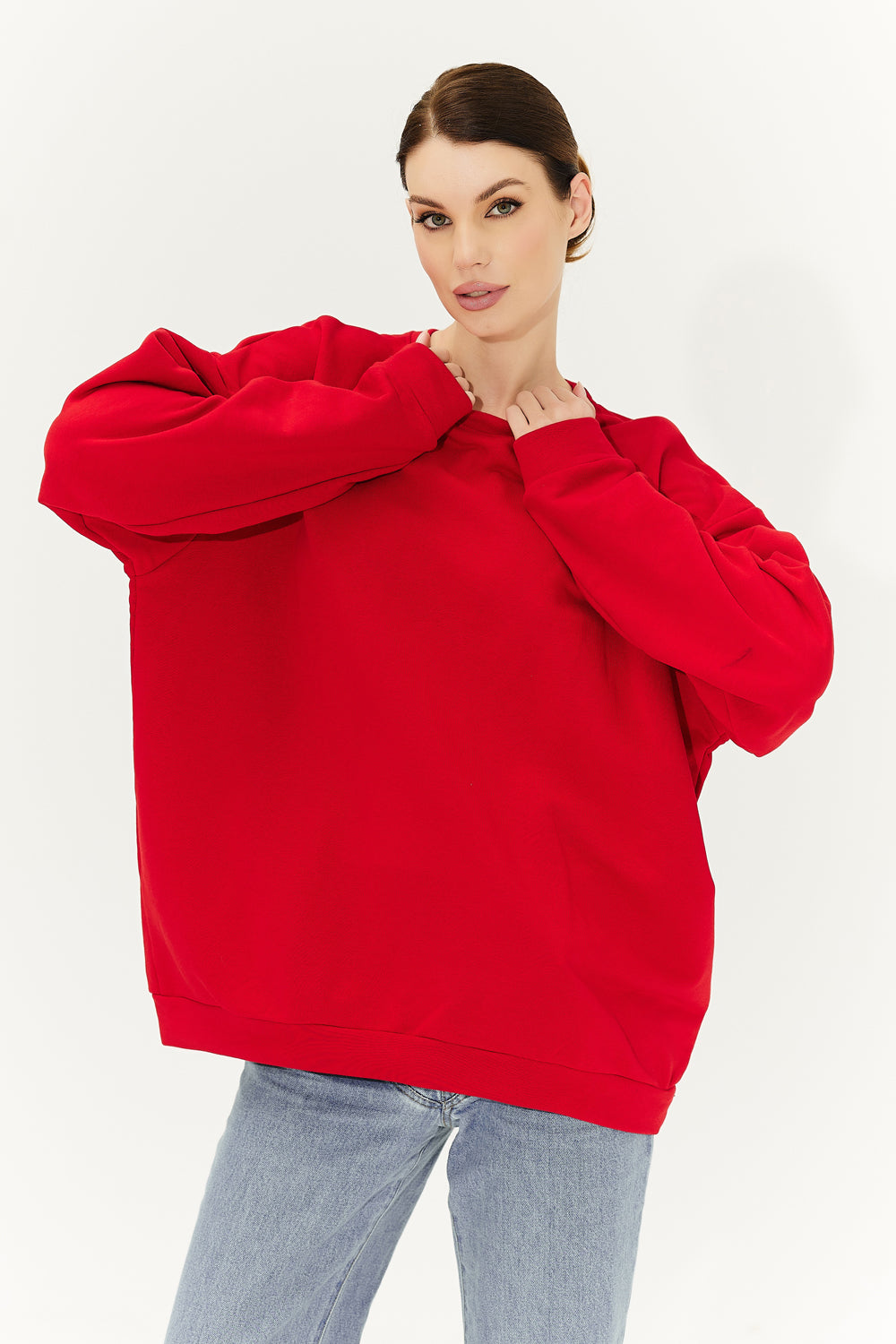 Red sweatshirt with a heart on the back.